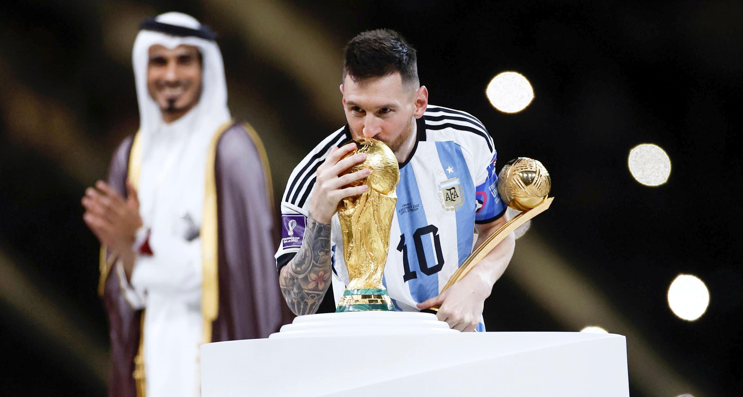 Argentina's Lionel Messi kisses the World Cup trophy