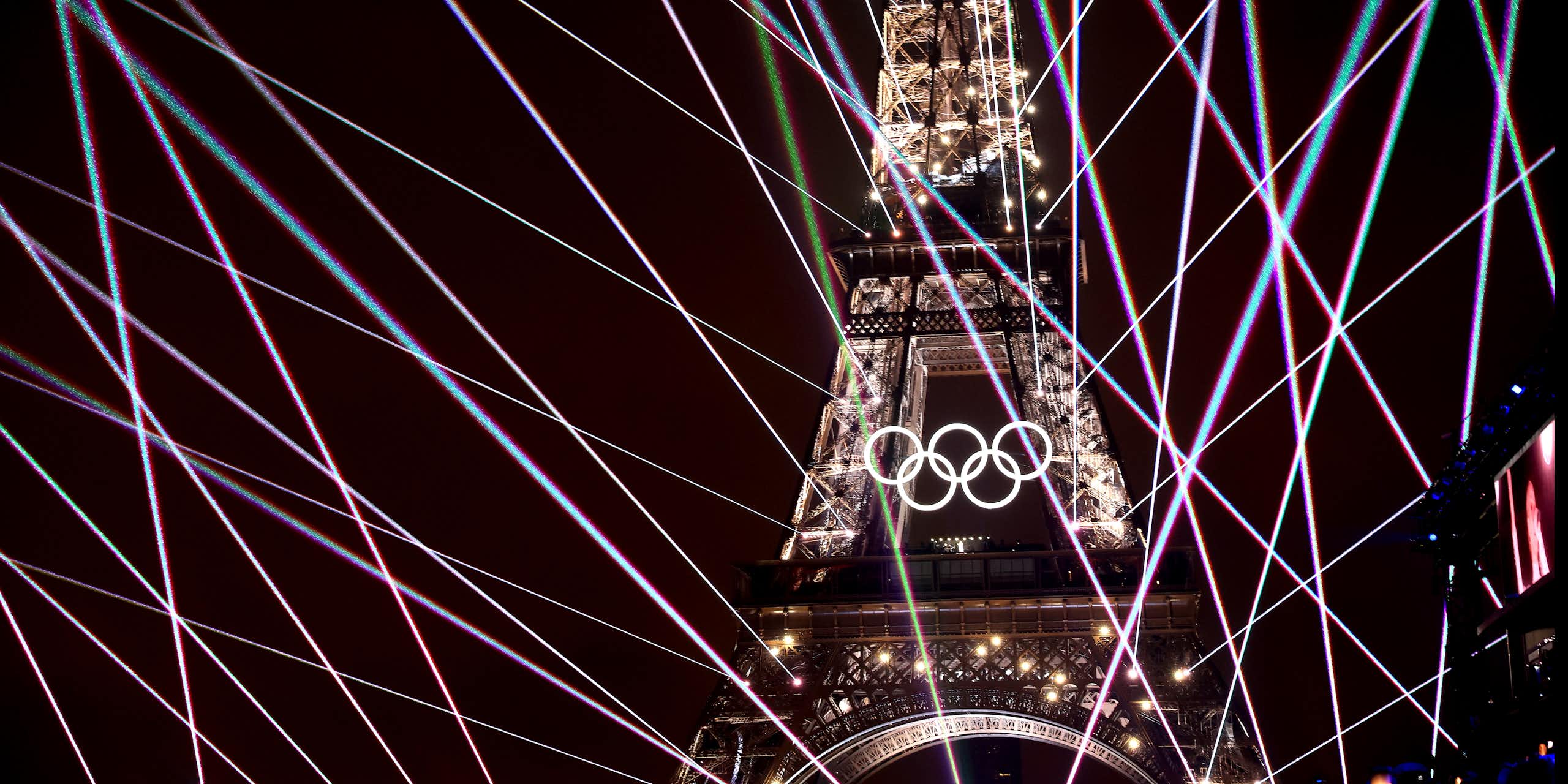 A light show illuminates the Eiffel Tower 