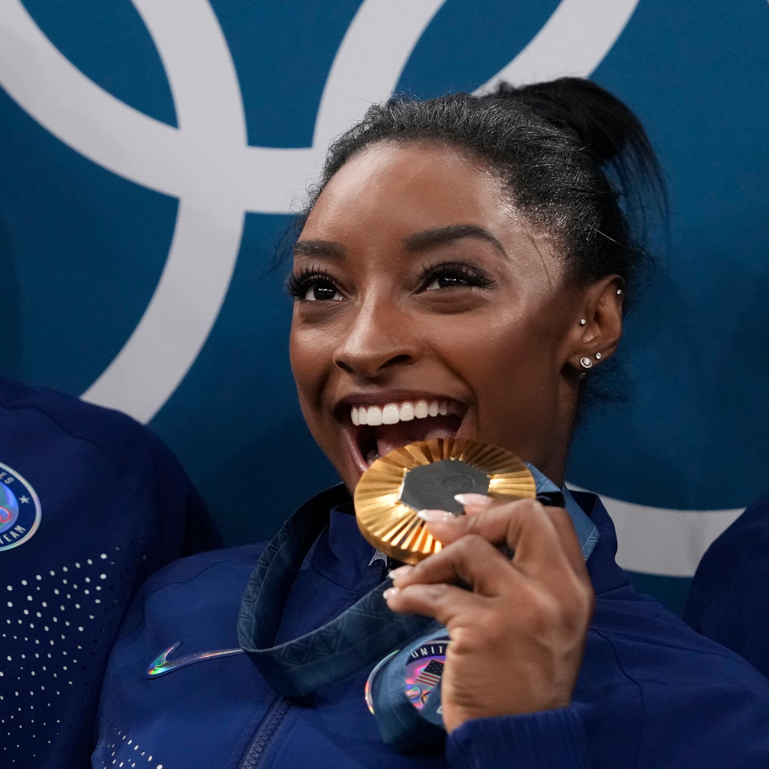Three young women with medals